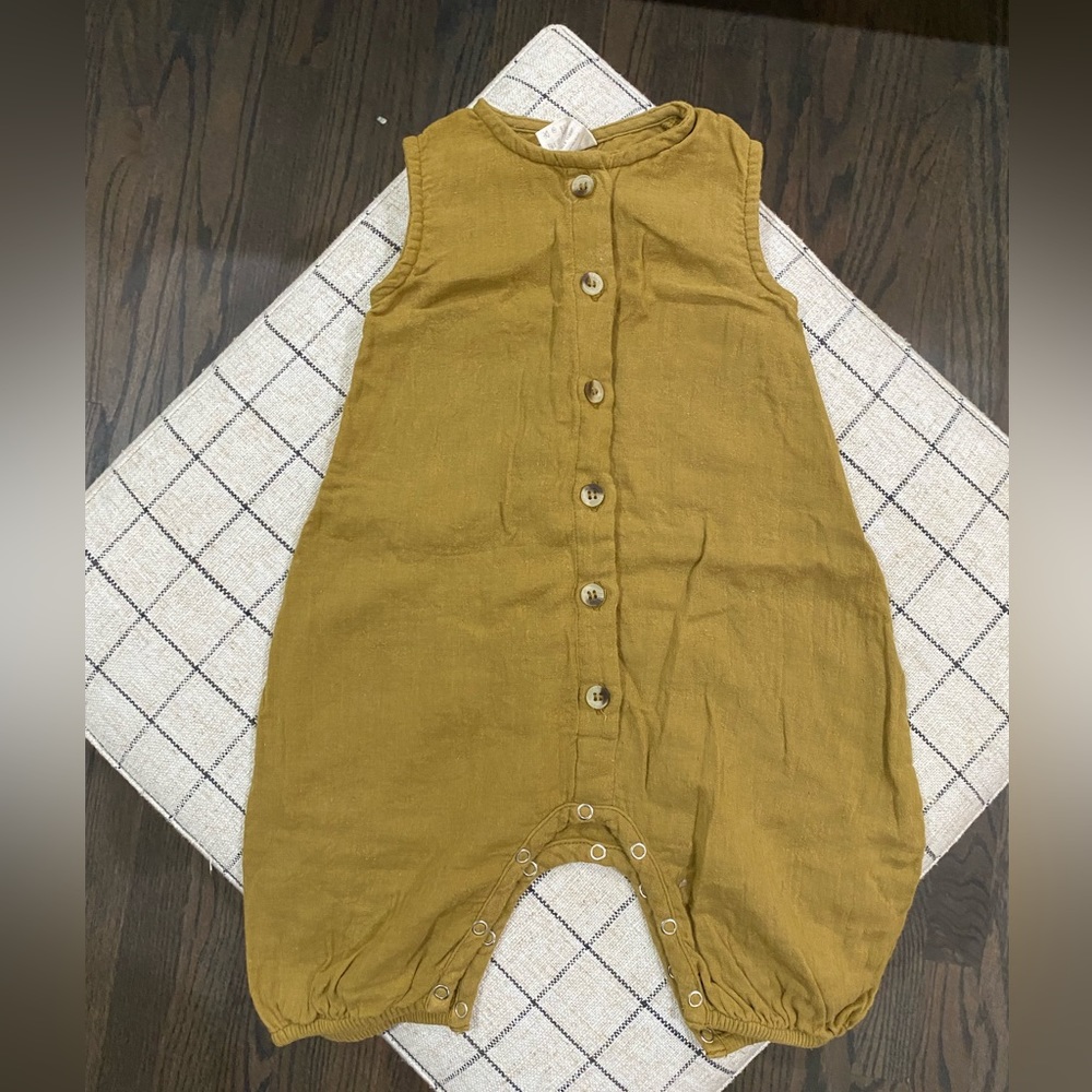 Kate Quinn 3-6 month romper with snaps.